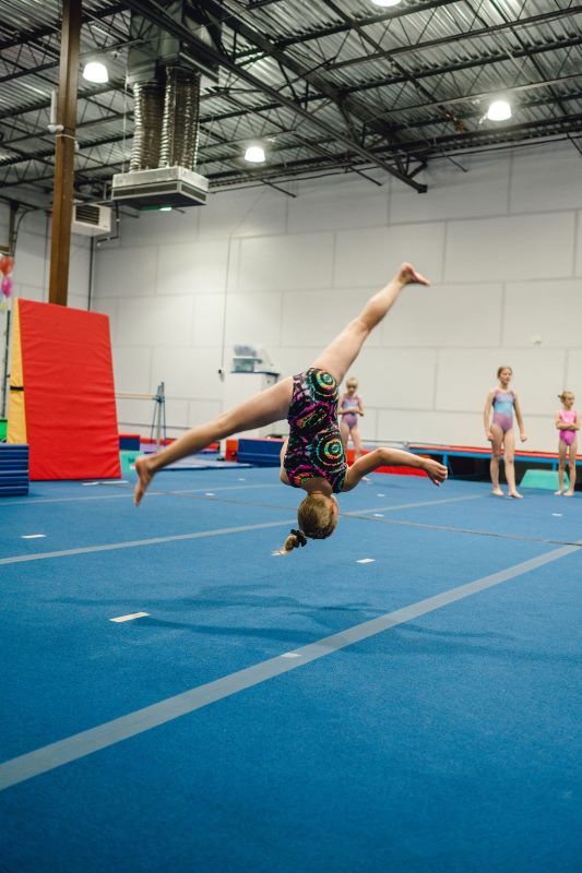 Cartwheel doing an aerial on the floor