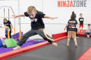 lil ninja kids jumping on the trampoline