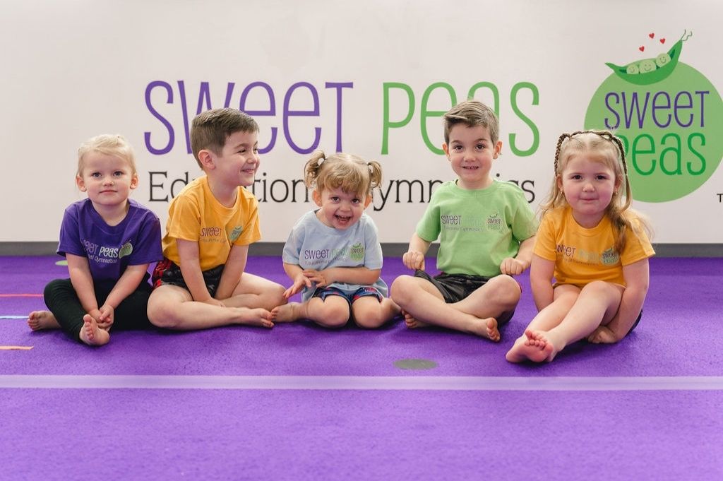 Movement-Based Learning kids sitting side by side