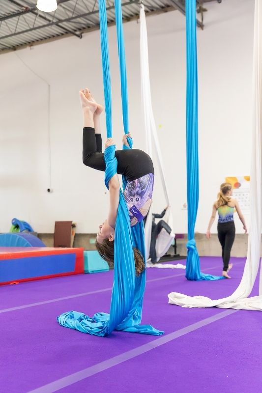 aerial silks young student practicing movements