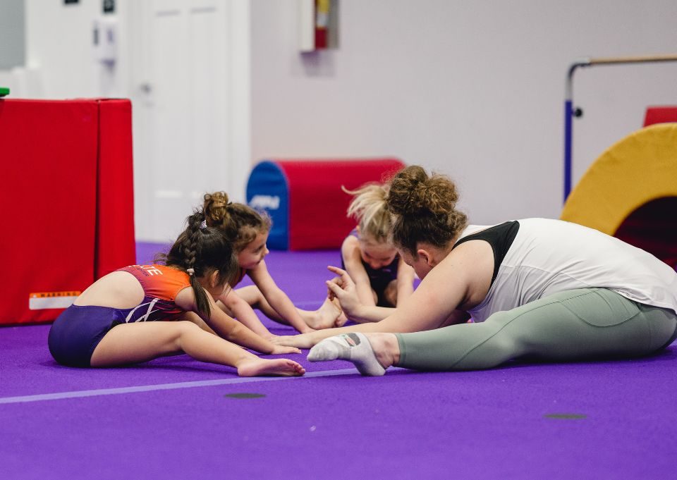 Consistency kids stretching in class session