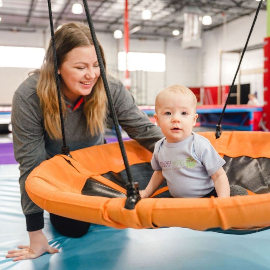 Multi-Discipline Training preschool kid swinging in class