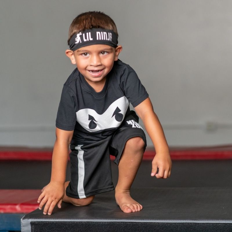 Choose the Right Class lil ninja class kid having fun on the trampoline