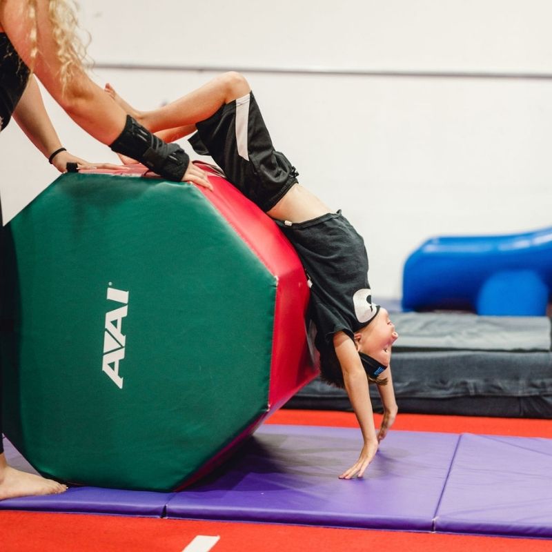 kids activity learning to do a backhandspring