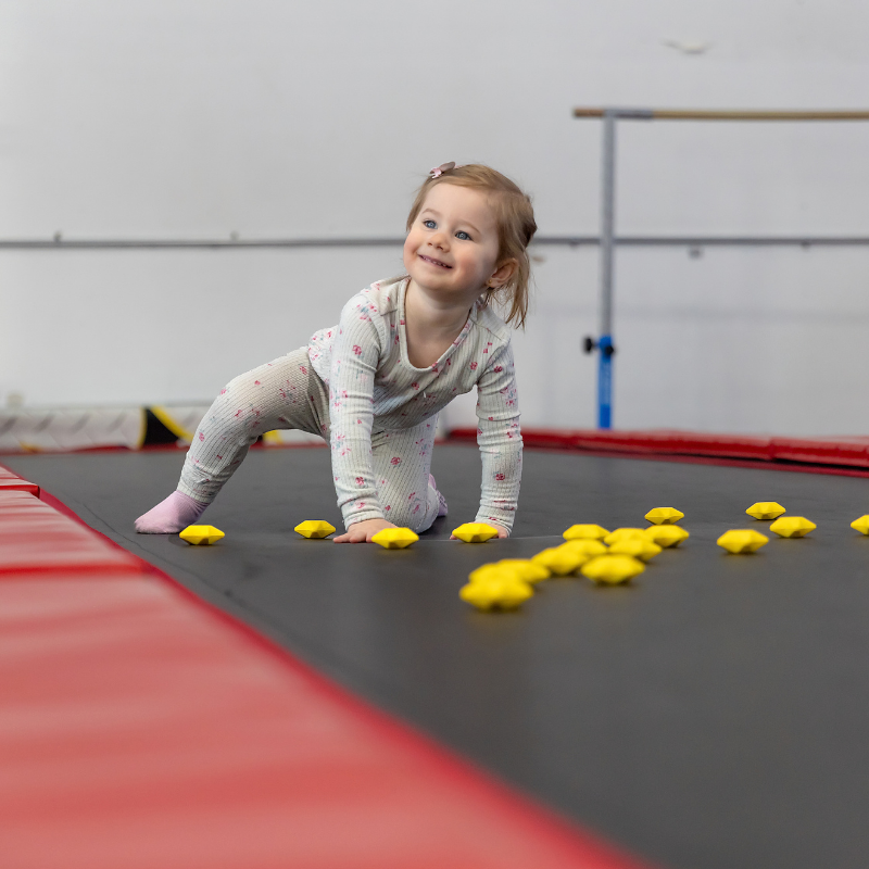 Growth spurt kid playing on the trampoline